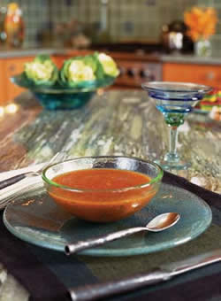 
The Schachters' Fire & Light recycled-glass dishes are a perfect complement for the recycled-glass tile backsplash.
